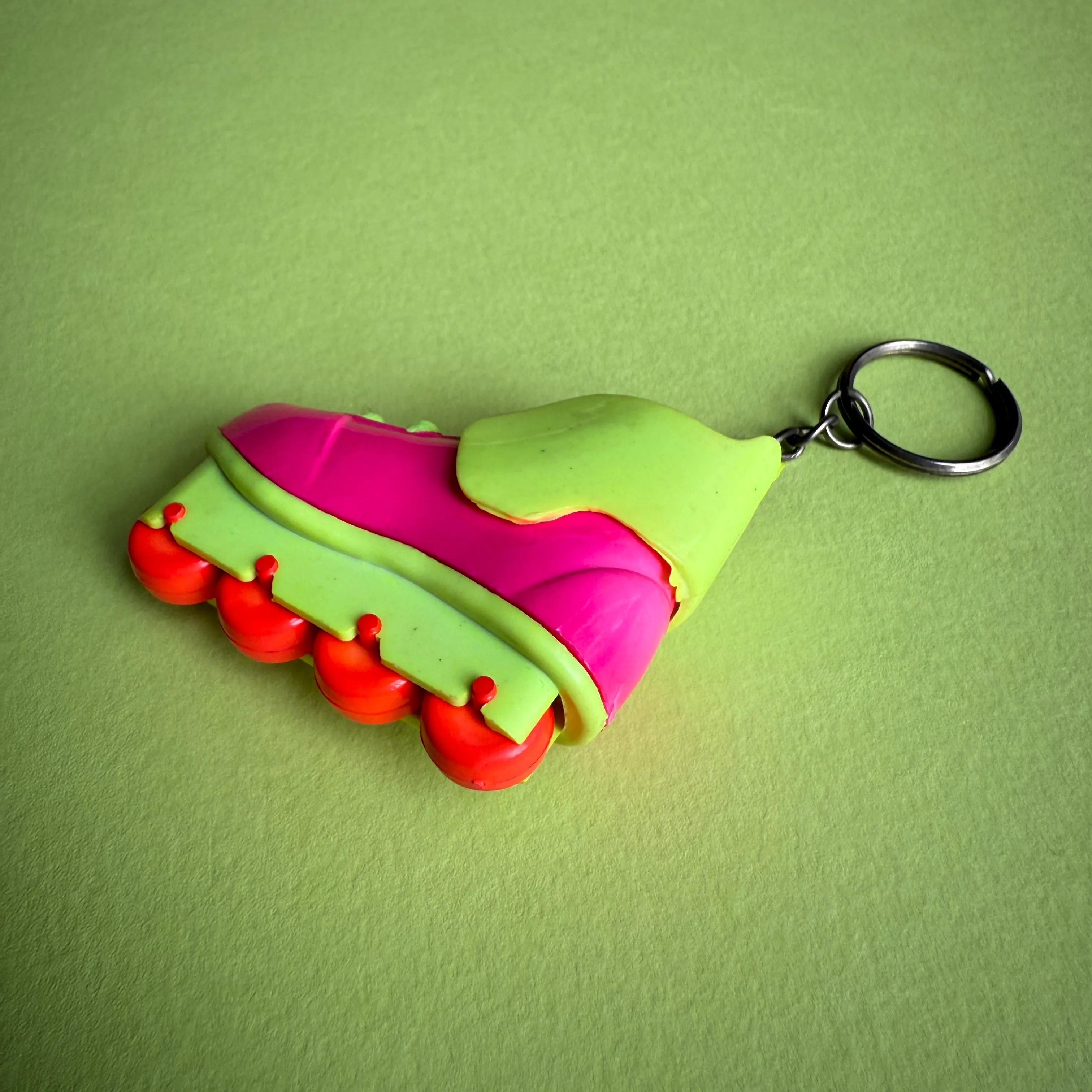 Neon 80s pink rollerblade charm